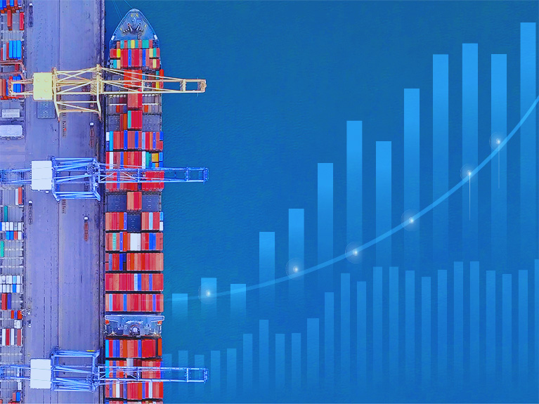 A Delmar employee holding a tablet while another employee taps on it.