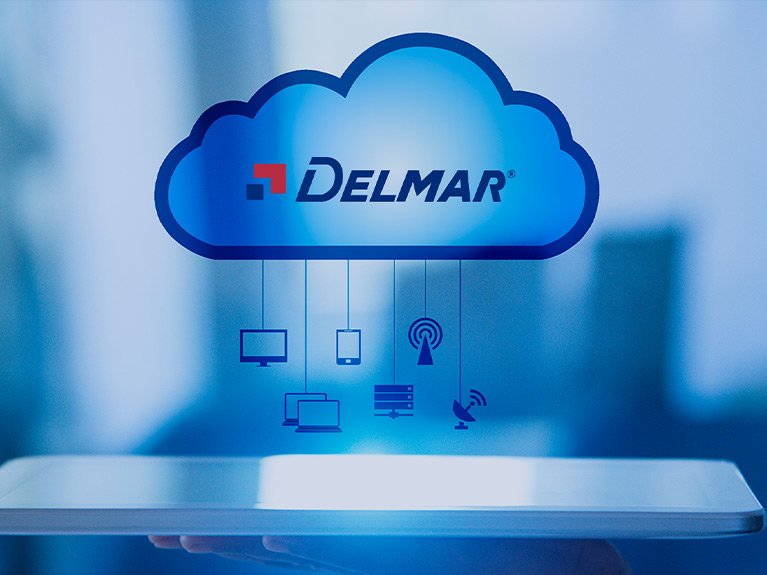 A tablet with a graphic of a cloud above it that is raining elements related to technology and connectivity.